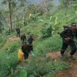 Army patrol and allegedly photograph villagers with weapons in Balukhali